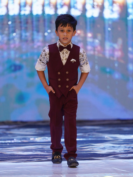 maroon waist coat, pants paired with printed shirt & a bow for boys 