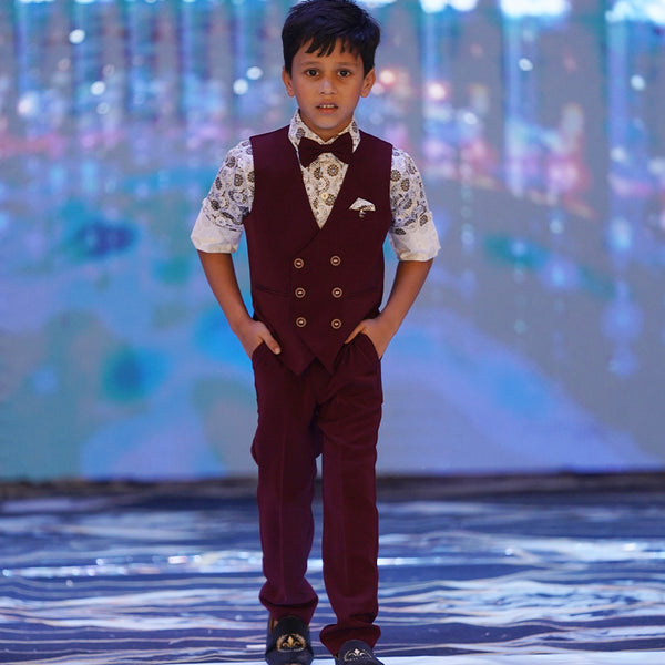 maroon waist coat, pants paired with printed shirt & a bow for boys 