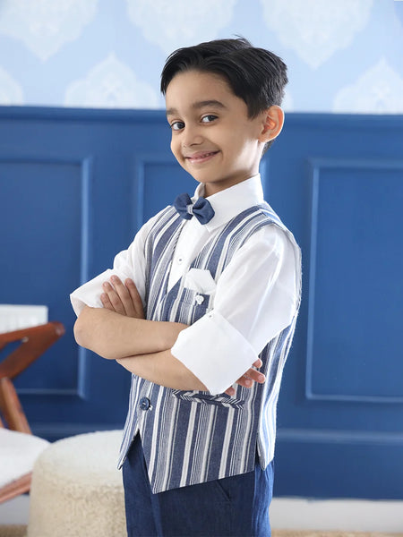  It features a matching bow, a cute broach and a pocket square that uplifts the entire look.