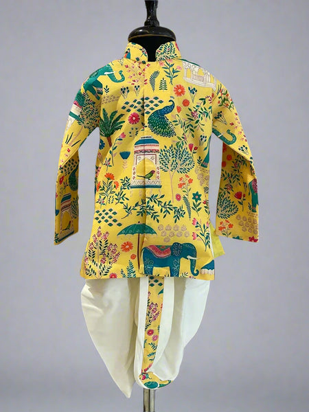 A yellow colored printed dhoti kurta set for boys displayed on a mannequin, featuring a floral and animal pattern.