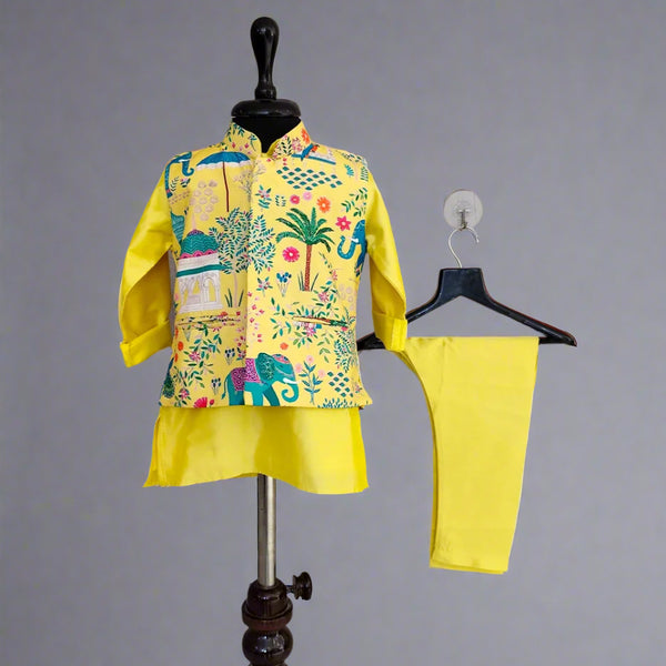 Yellow children's outfit with patterned jacket and matching pants on a hanger against a plain background.