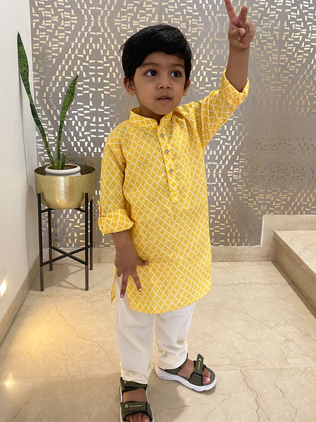 It is a self-checked smart kurta for a kid boy that comes with a matching pyjama.