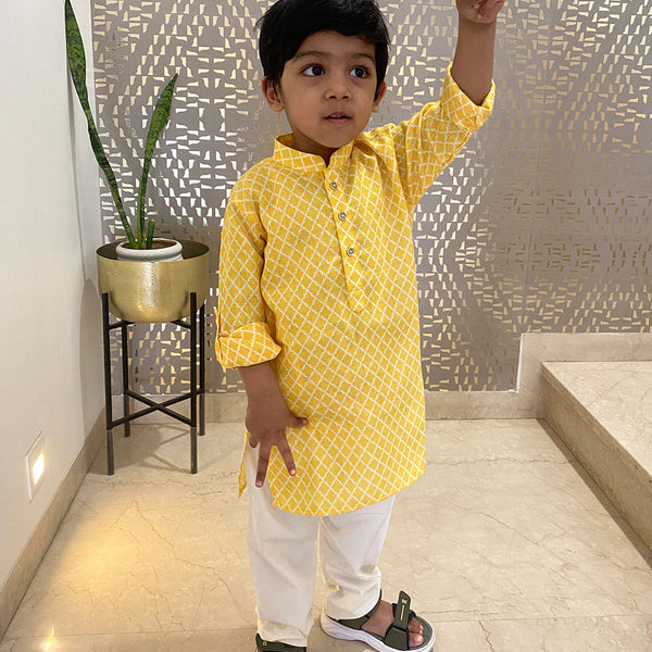 It is a self-checked smart kurta for a kid boy that comes with a matching pyjama.